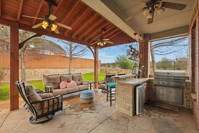 820 Clearlake Dr, Prosper, TX 75078 - view of patio featuring a ceiling fan, a grill, and a fenced backyard