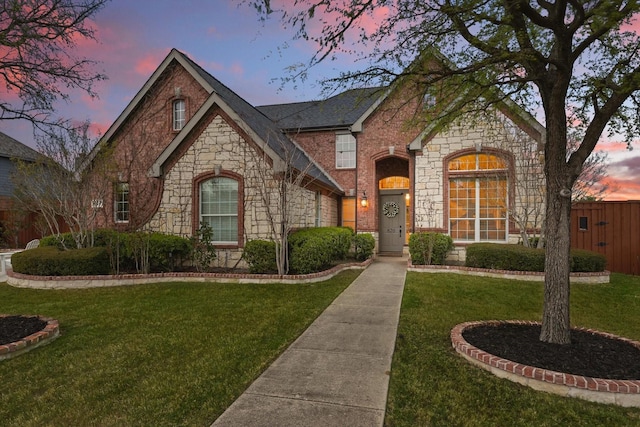 820 Clearlake Dr, Prosper, TX 75078 - view of front of house featuring stone siding and a front yard