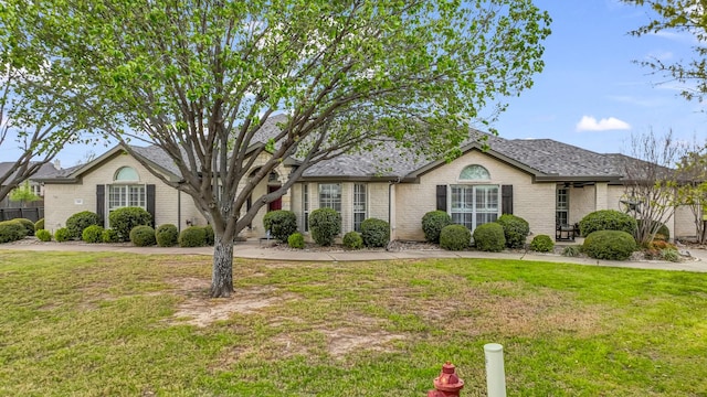 109 Meadow Glen Ct, Aledo, TX 76008 - view of front of property featuring brick siding, a front yard, and a shingled roof