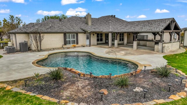 109 Meadow Glen Ct, Aledo, TX 76008 - view of pool with exterior kitchen, a patio, fence, and central air condition unit
