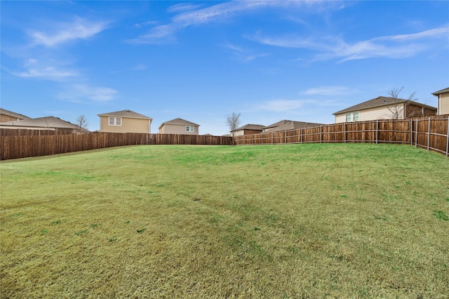 view of yard featuring a fenced backyard