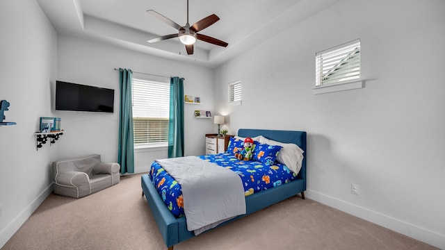 1651 Wynne Ave, Prosper, TX 75078 - bedroom featuring carpet, baseboards, a raised ceiling, and a ceiling fan