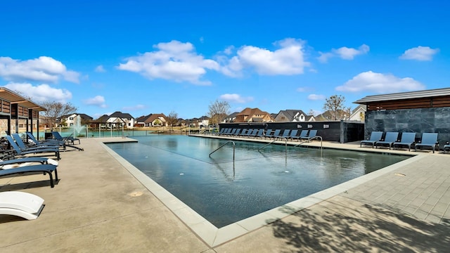 1651 Wynne Ave, Prosper, TX 75078 - community pool featuring a residential view and a patio area