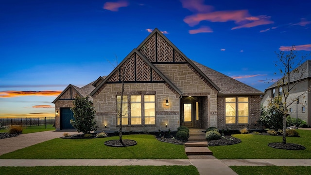 1651 Wynne Ave, Prosper, TX 75078 - view of front of home with stone siding and driveway