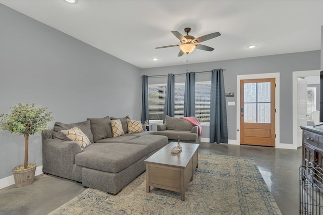 631 E Texas St, Denison, TX 75021 - living area featuring concrete floors, recessed lighting, ceiling fan, and baseboards