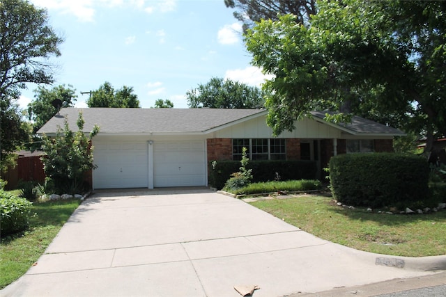 4605 Avoca St, Fort Worth, TX 76132 - single story home with an attached garage, driveway, brick siding, and a front lawn