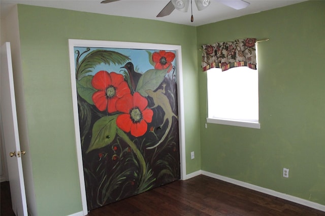 4605 Avoca St, Fort Worth, TX 76132 - unfurnished bedroom with wood finished floors, baseboards, and a ceiling fan