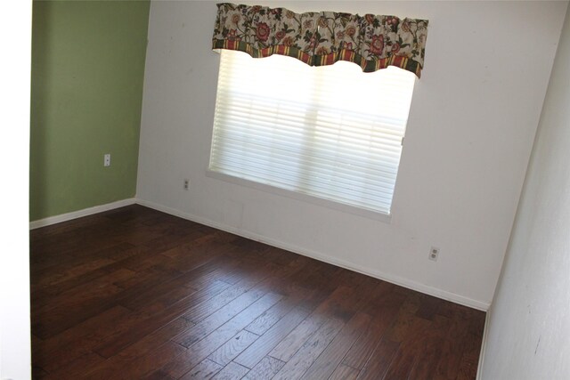 4605 Avoca St, Fort Worth, TX 76132 - spare room featuring wood-type flooring and baseboards