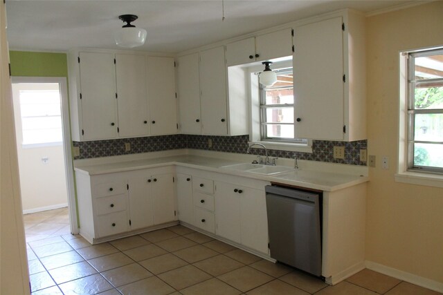 4605 Avoca St, Fort Worth, TX 76132 - kitchen with stainless steel dishwasher, a sink, backsplash, and light tile patterned flooring