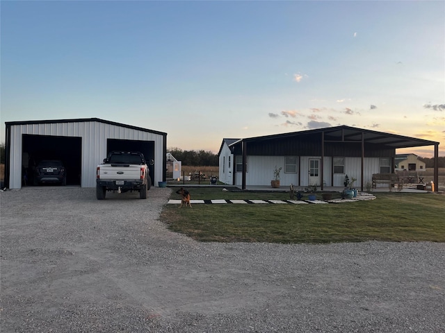 view of outdoor structure with an outbuilding and driveway