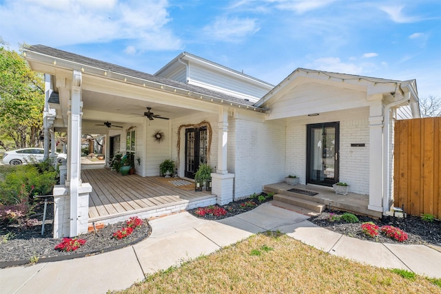 320 Eastwood Ave, Fort Worth, TX 76107 - view of front of property featuring a ceiling fan, brick siding, and a porch