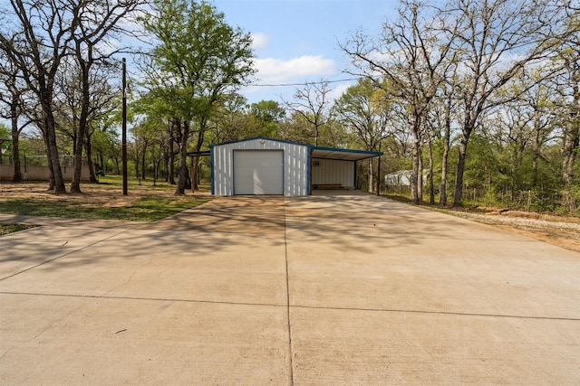 161 Mariah Dr, Weatherford, TX 76087 - garage with driveway and a garage