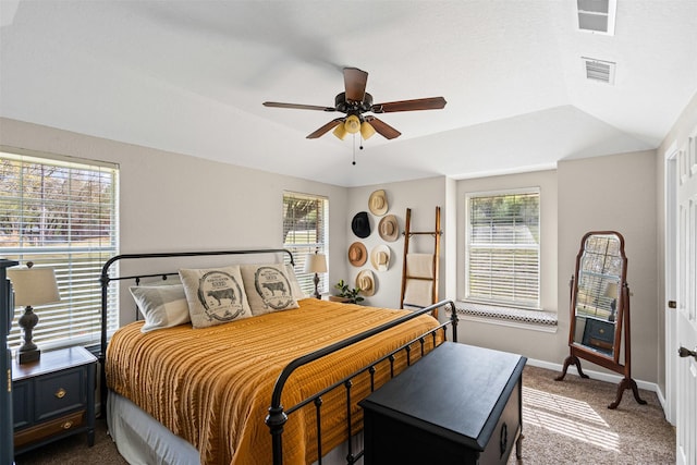161 Mariah Dr, Weatherford, TX 76087 - bedroom with dark colored carpet, multiple windows, baseboards, and ceiling fan