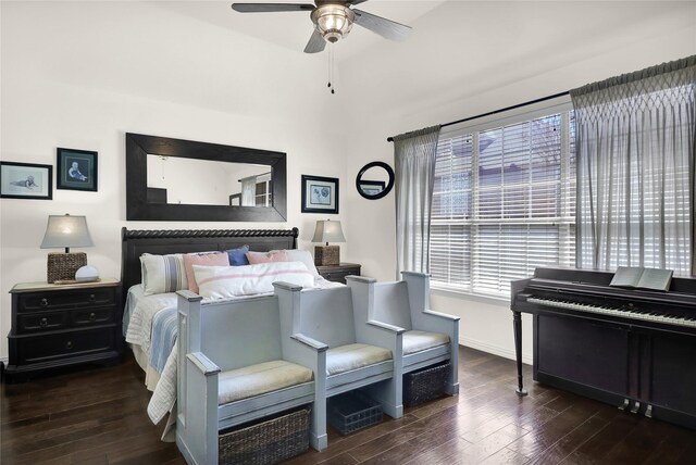 bedroom featuring hardwood / wood-style flooring, baseboards, and a ceiling fan