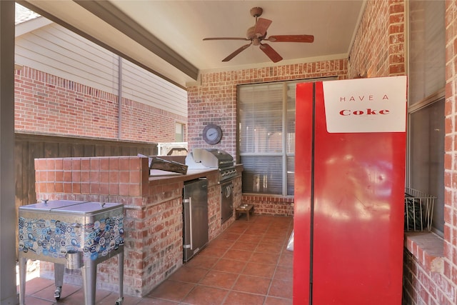 view of patio / terrace featuring a ceiling fan and area for grilling