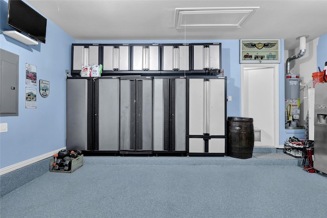 garage featuring baseboards, electric panel, and gas water heater