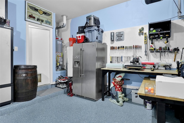 interior space featuring water heater and stainless steel fridge with ice dispenser