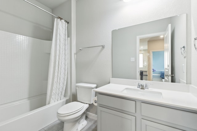 2549 Stella Ln, Northlake, TX 76247 - bathroom with toilet, vanity, shower / bathtub combination with curtain, tile patterned flooring, and baseboards