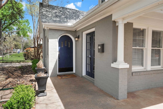 930 N Clinton Ave, Dallas, TX 75208 - unfurnished living room featuring baseboards, crown molding, wood finished floors, recessed lighting, and arched walkways