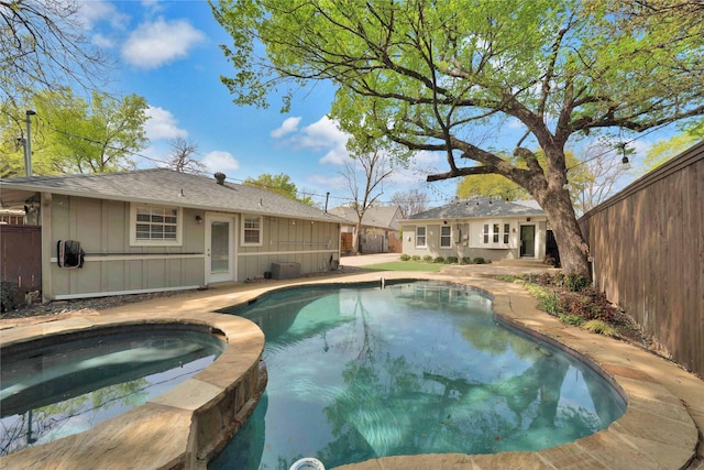 930 N Clinton Ave, Dallas, TX 75208 - view of pool with a fenced backyard, a patio, and a pool with connected hot tub