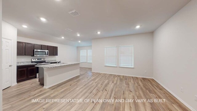 12520 Tarres Ct, Lorena, TX 76655 - kitchen featuring a sink, visible vents, light wood-style floors, and appliances with stainless steel finishes