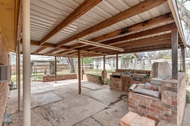 view of patio / terrace featuring fence and area for grilling