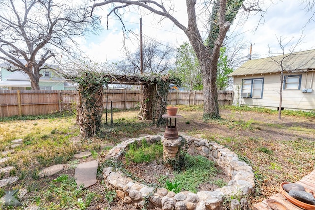 view of yard with a fenced backyard