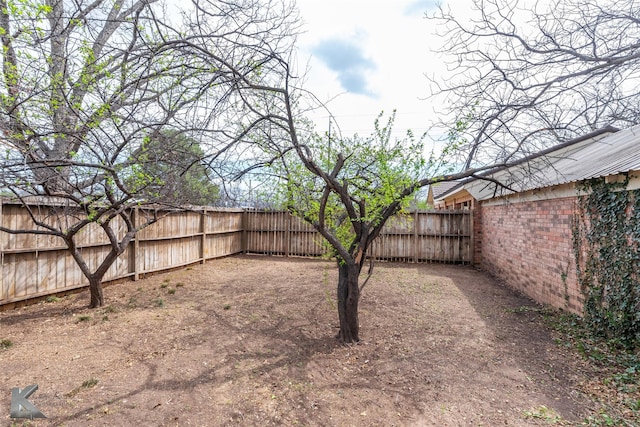 view of yard featuring a fenced backyard