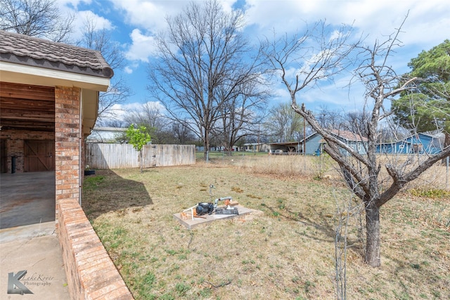 view of yard featuring fence