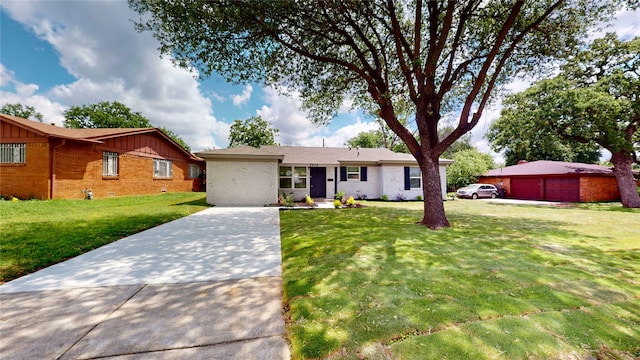 5609 Maceo Ln, Fort Worth, TX 76112 - ranch-style house featuring brick siding, a front lawn, a detached garage, and board and batten siding