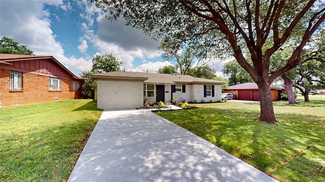 5609 Maceo Ln, Fort Worth, TX 76112 - single story home with brick siding, a front lawn, a detached garage, and board and batten siding