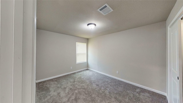 5609 Maceo Ln, Fort Worth, TX 76112 - carpeted empty room with a textured ceiling and baseboards