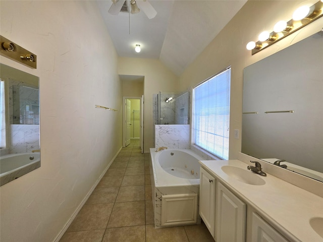 701 Canal St, Irving, TX 75063 - bathroom with tile patterned flooring, walk in shower, a jetted tub, lofted ceiling, and double vanity
