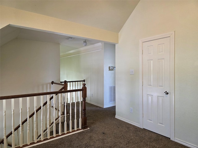 701 Canal St, Irving, TX 75063 - hall featuring carpet floors, lofted ceiling, baseboards, and an upstairs landing