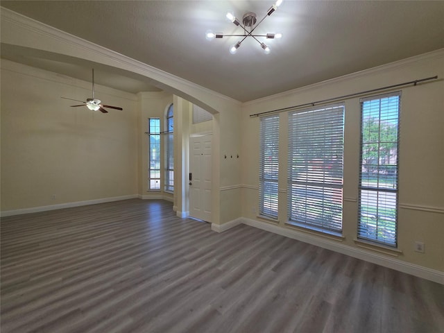 701 Canal St, Irving, TX 75063 - unfurnished room featuring crown molding, a chandelier, wood finished floors, and plenty of natural light