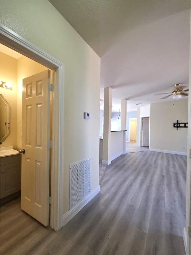 701 Canal St, Irving, TX 75063 - hall with wood finished floors and baseboards