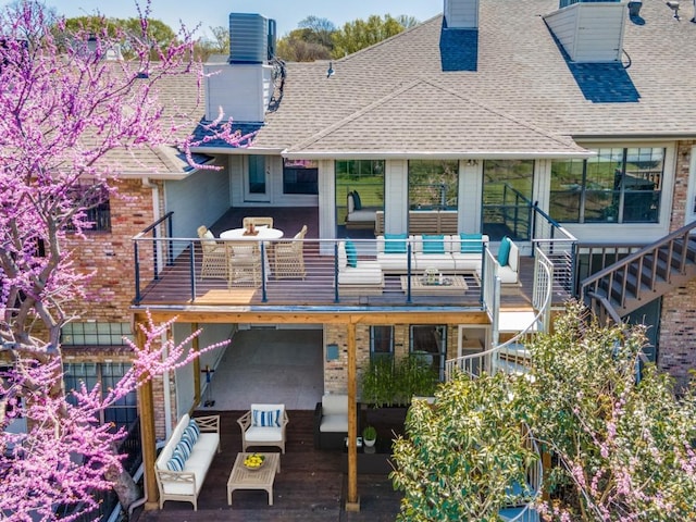 5538 Canada Ct, Rockwall, TX 75032 - back of house with an outdoor hangout area, a chimney, roof with shingles, stairs, and a deck
