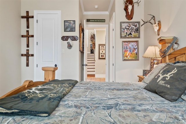 bedroom featuring ornamental molding
