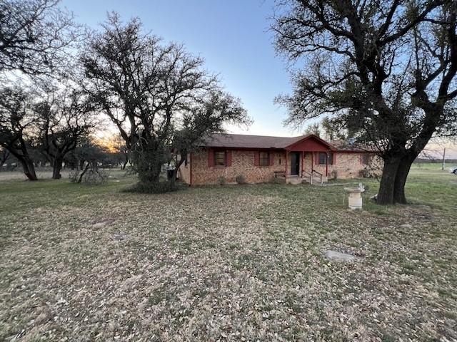 409 County Road 102, Caddo, TX 76429 - exterior space featuring a front yard