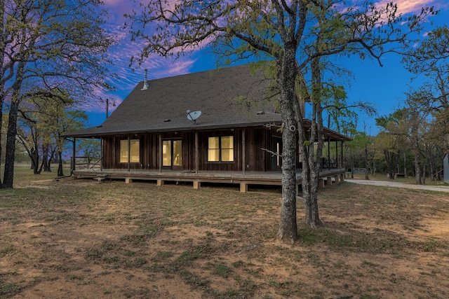 view of front of house with roof with shingles