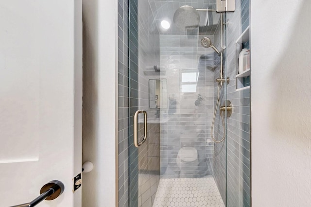 bathroom featuring a stall shower