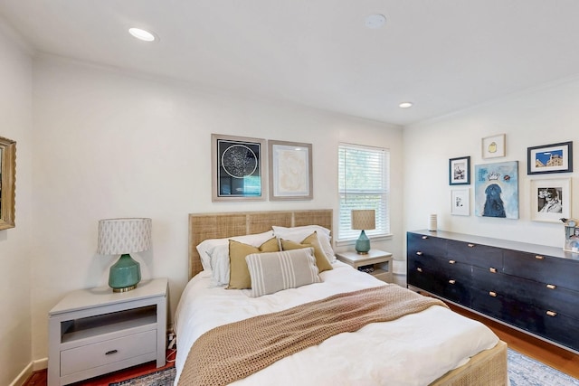 bedroom featuring recessed lighting, wood finished floors, and baseboards
