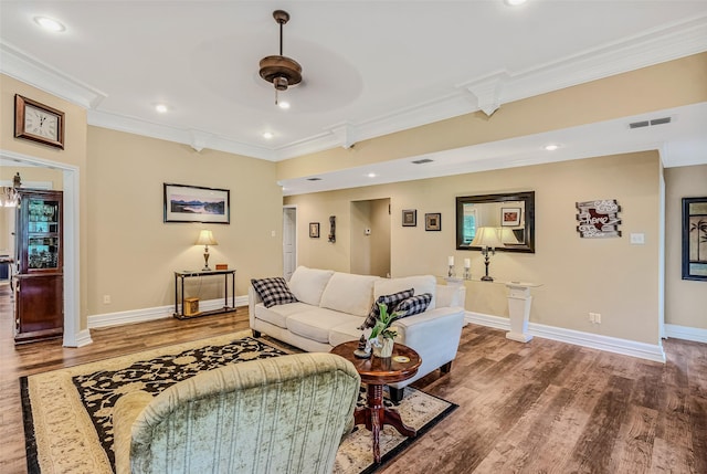 130 Vz County Road 3509, Edgewood, TX 75117 - living room featuring crown molding, wood finished floors, baseboards, visible vents, and recessed lighting