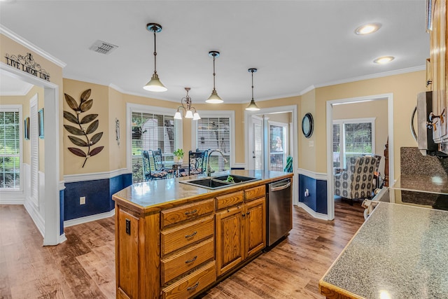 130 Vz County Road 3509, Edgewood, TX 75117 - kitchen with light wood finished floors, a wealth of natural light, a sink, and dishwasher