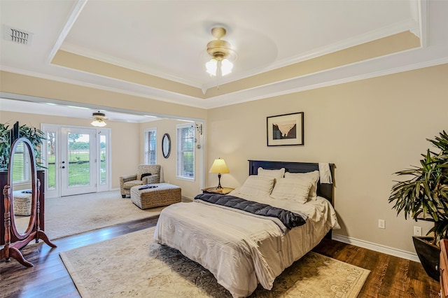 130 Vz County Road 3509, Edgewood, TX 75117 - bedroom with dark wood-style flooring, access to outside, a raised ceiling, and visible vents