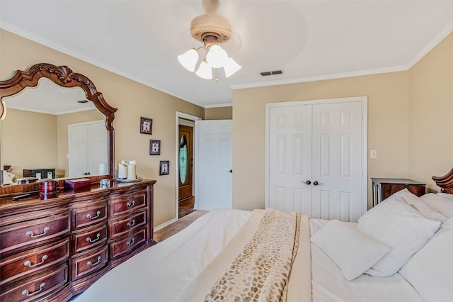 130 Vz County Road 3509, Edgewood, TX 75117 - bedroom with crown molding, a closet, baseboards, visible vents, and ceiling fan