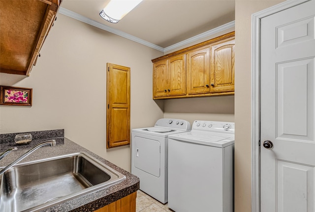 130 Vz County Road 3509, Edgewood, TX 75117 - laundry room with ornamental molding, a sink, washer and clothes dryer, cabinet space, and light tile patterned floors