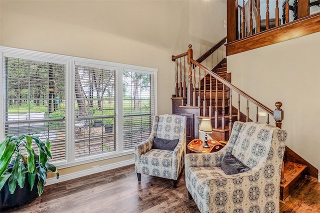130 Vz County Road 3509, Edgewood, TX 75117 - sitting room with a towering ceiling, wood finished floors, and stairway