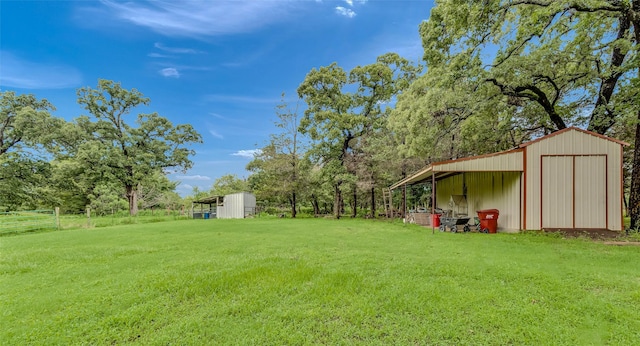 130 Vz County Road 3509, Edgewood, TX 75117 - view of yard with an outdoor structure, a garage, and a pole building