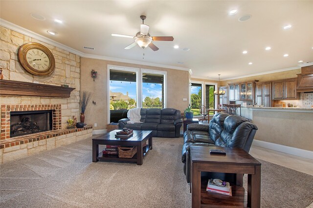 living room featuring recessed lighting, visible vents, a ceiling fan, and ornamental molding
